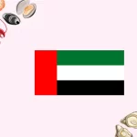 feature image-ajman fish market-image with fish on either side and uae flag at the middle-01
