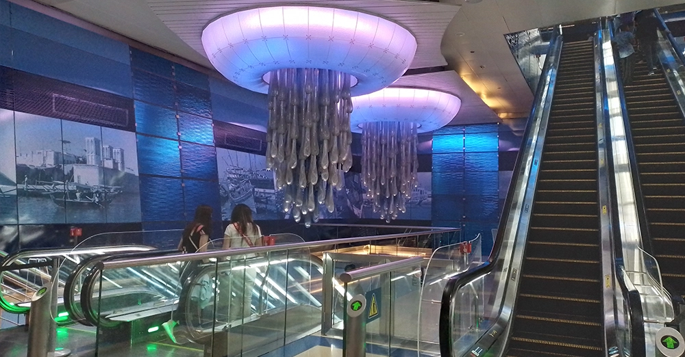inarticle image-green line metro station-escalators at burjuman